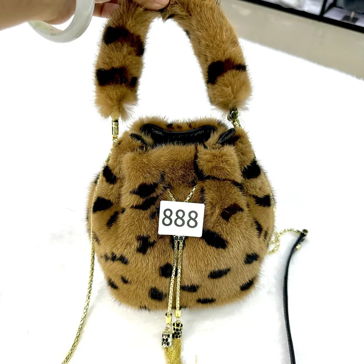 秋冬新款进口整皮水貂毛水桶女包链条抽绳手提单肩包洋气手拎小包