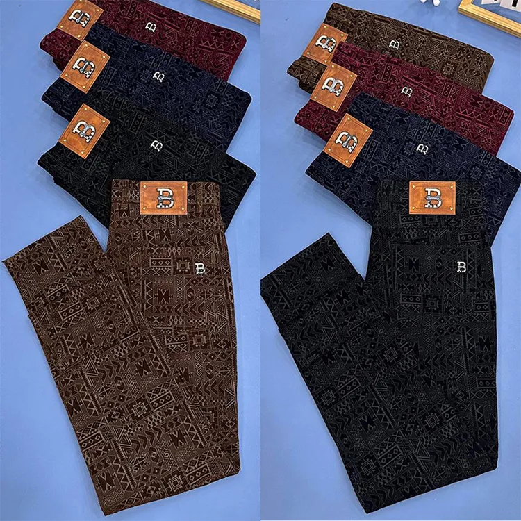 秋冬新款轻奢植绒男士休闲裤欧货商务气质西装裤潮流字母小直脚裤