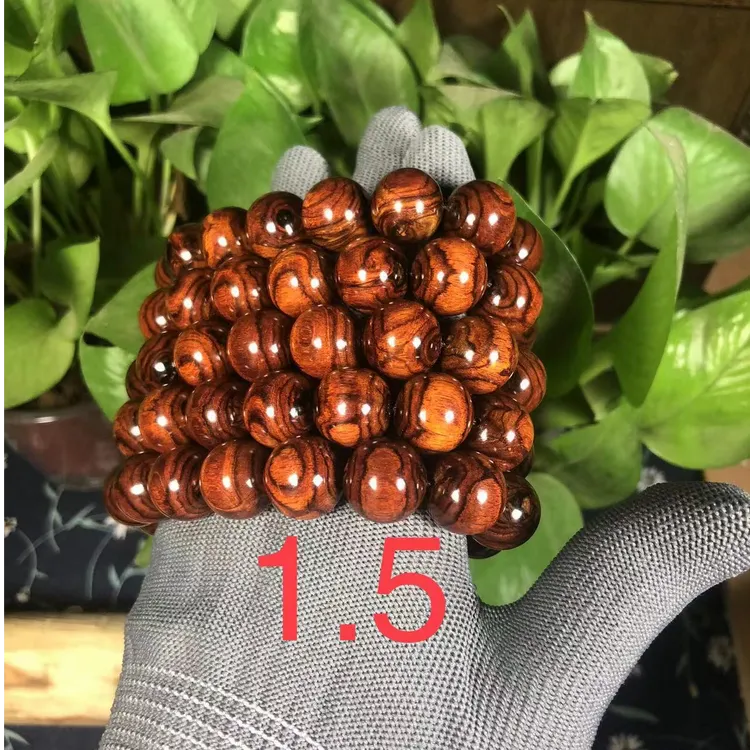 海南黄花梨 1.5X15颗 满鬼脸 对眼X纹 （多样性发其一）