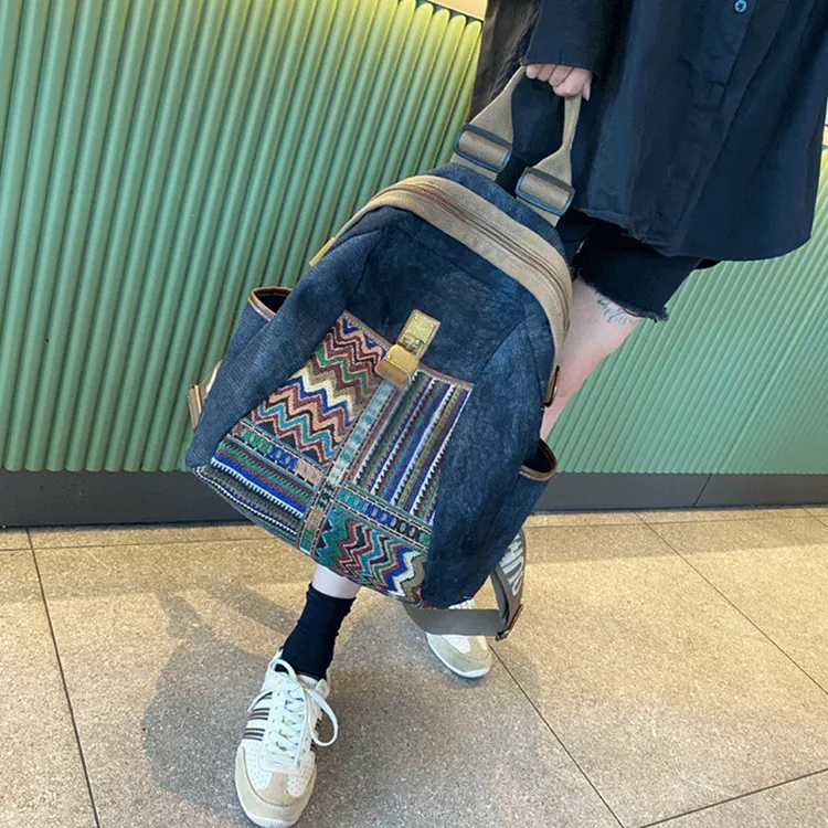 新款2025时尚大容量刺绣牛仔布双肩包女包民族风帆布背包旅行包潮