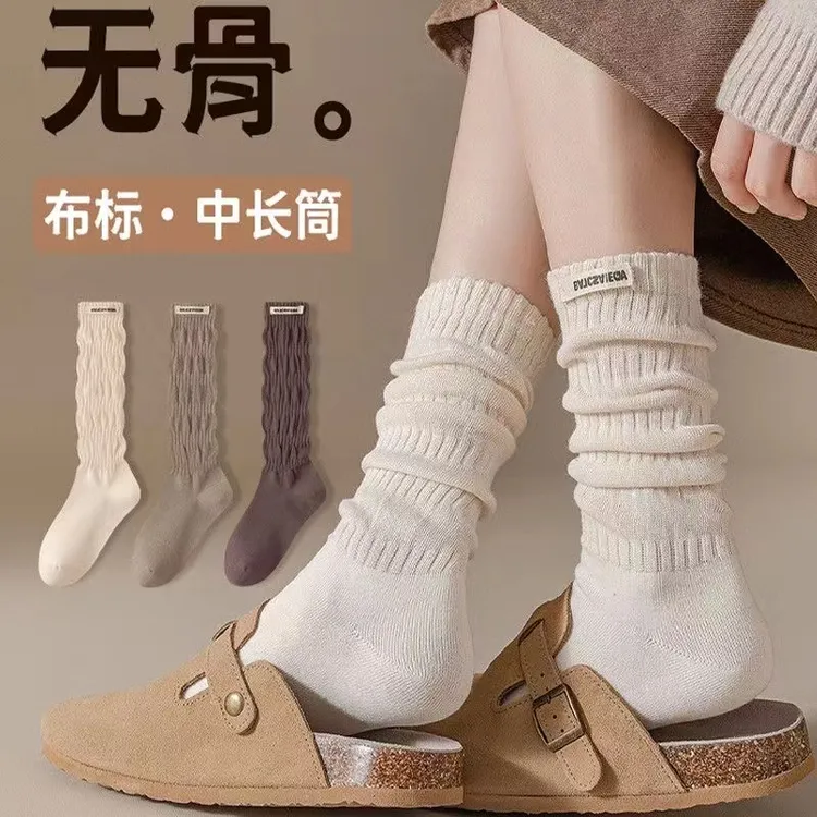 堆堆袜子女无骨缝合中筒棉袜ins潮流百搭字母布标四季款长筒袜