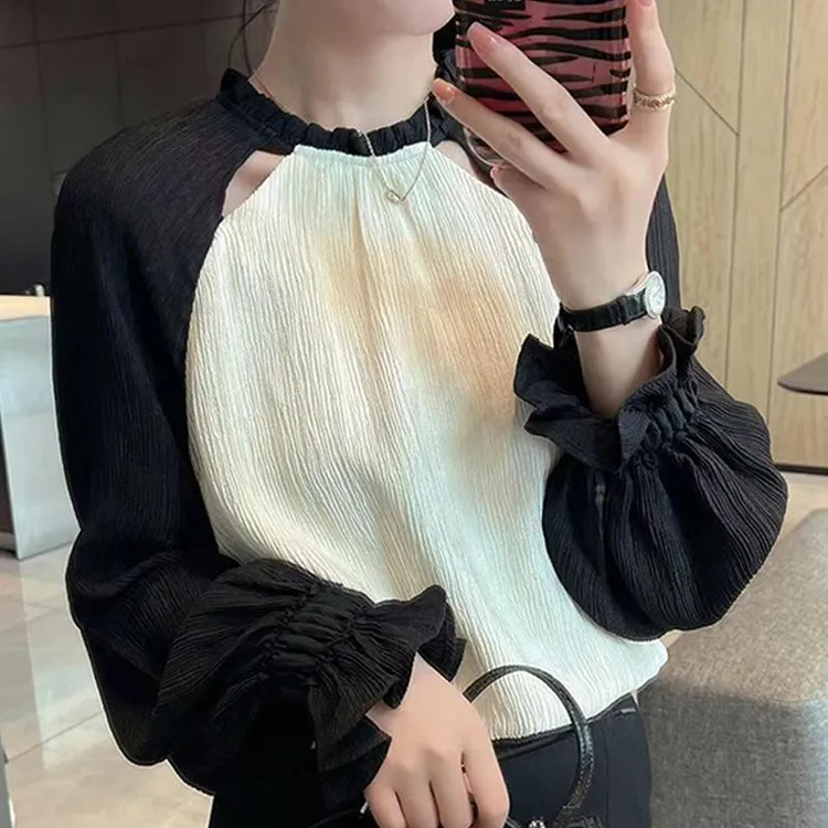 高端时髦洋气黑白撞色镂空长袖衬衫女春秋法式独特别致设计感上衣