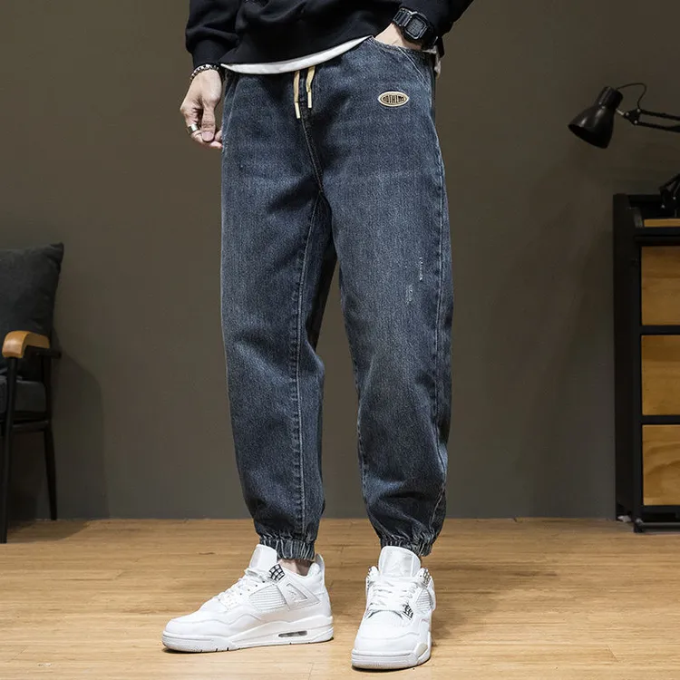 春秋新款潮牌束脚牛仔裤男宽松爆款运动哈伦裤加绒男士休闲九分裤