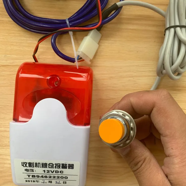 新款收割机粮仓粮满报警器