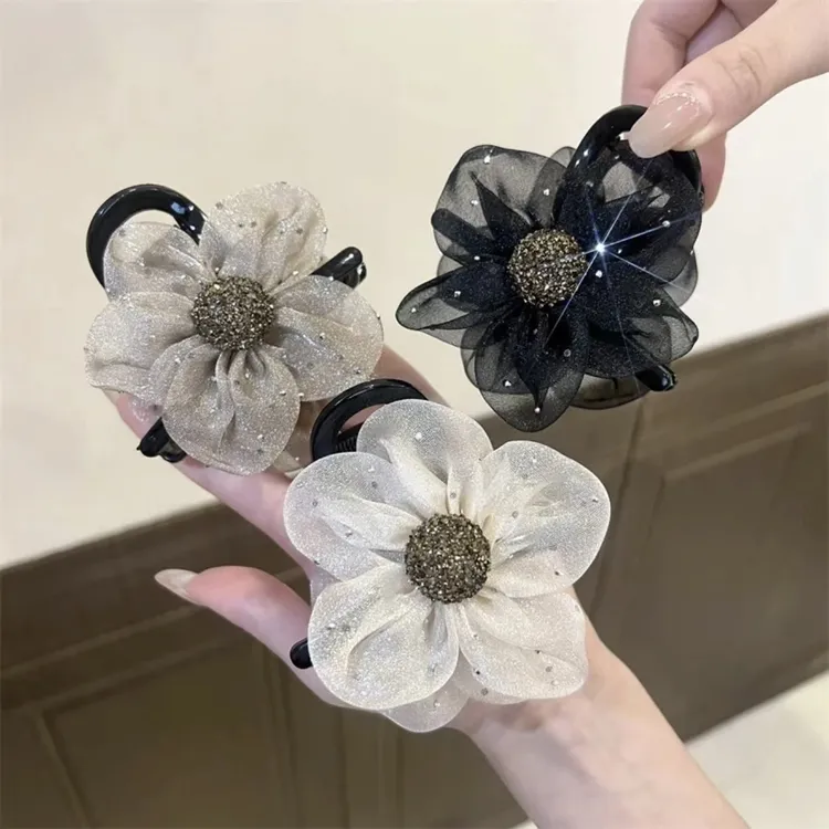 新款高端轻奢太阳花水钻花朵抓夹马尾丸子头抓夹气质百搭发饰