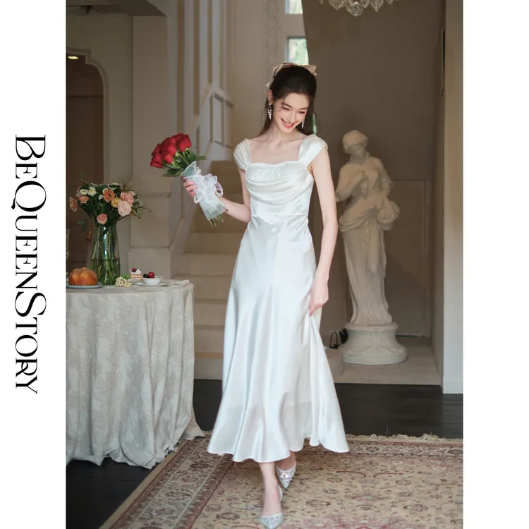 余潇潇【白玉水仙】设计感光泽飘逸优雅法式醋酸钉珠连衣裙