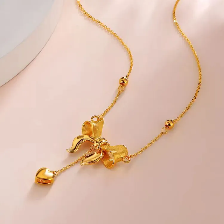 SUNFEEL/赛菲尔万足®足金在逃公主蝴蝶结吊坠套链黄金项链套链