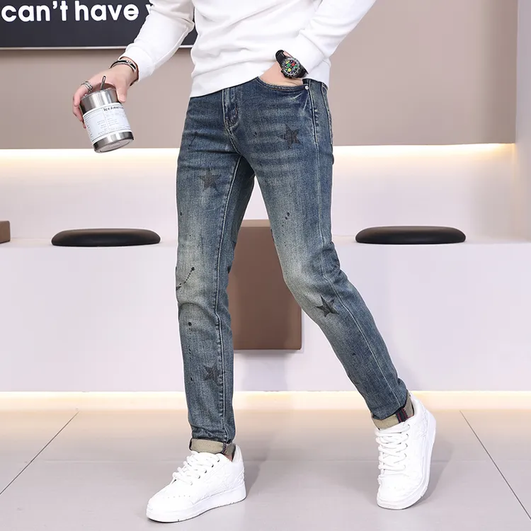 吉伦略索秋冬季男士牛仔裤修身小脚潮牌五角星时尚弹力休闲长裤