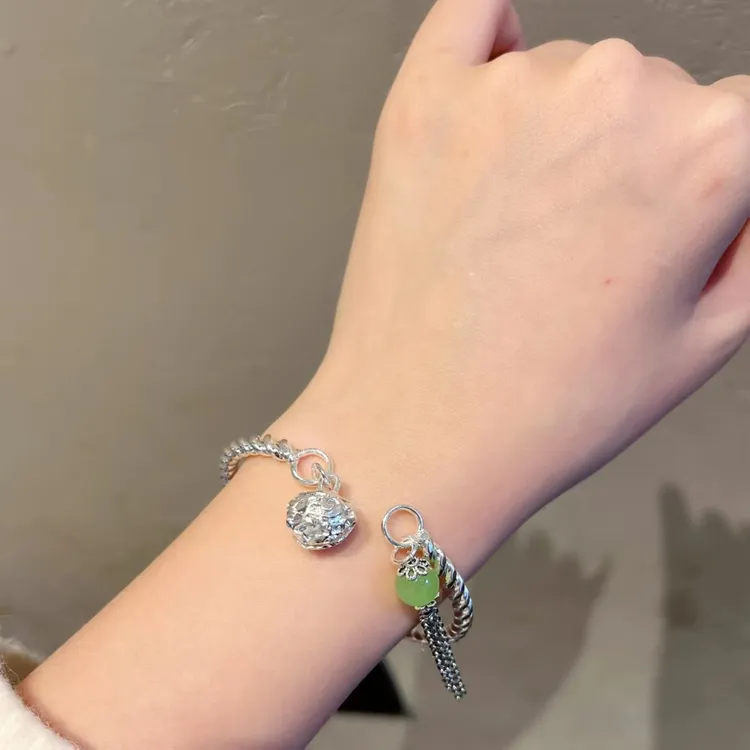 铜合金玻璃手镯 88240一步一响复古流苏手镯