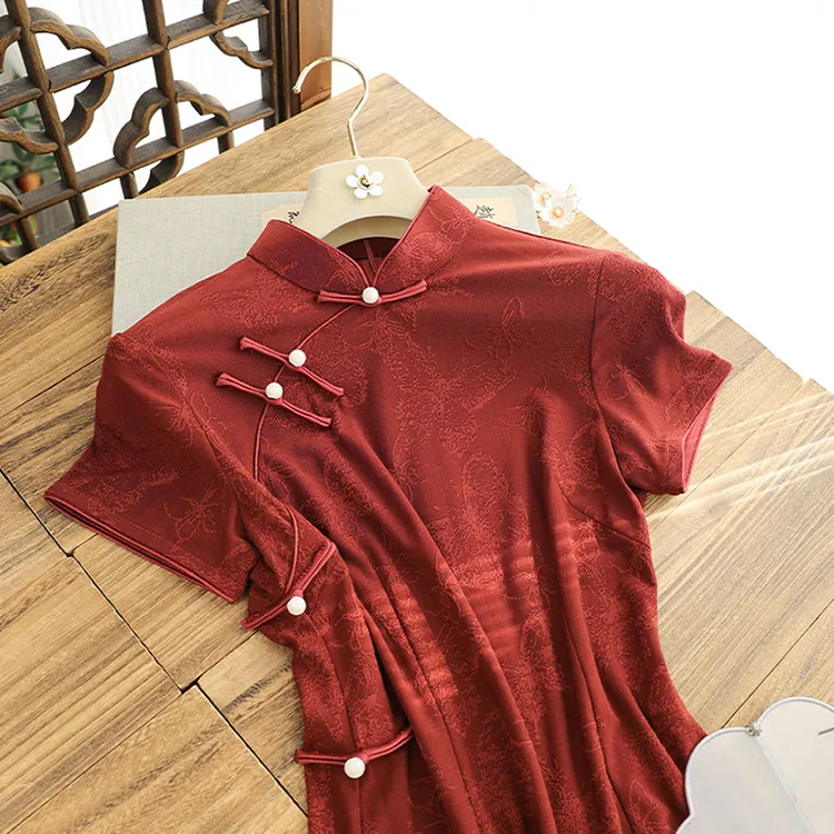 俏娘鱼2025年春季新款古法改良新中式红色针织提花复古送考旗袍女