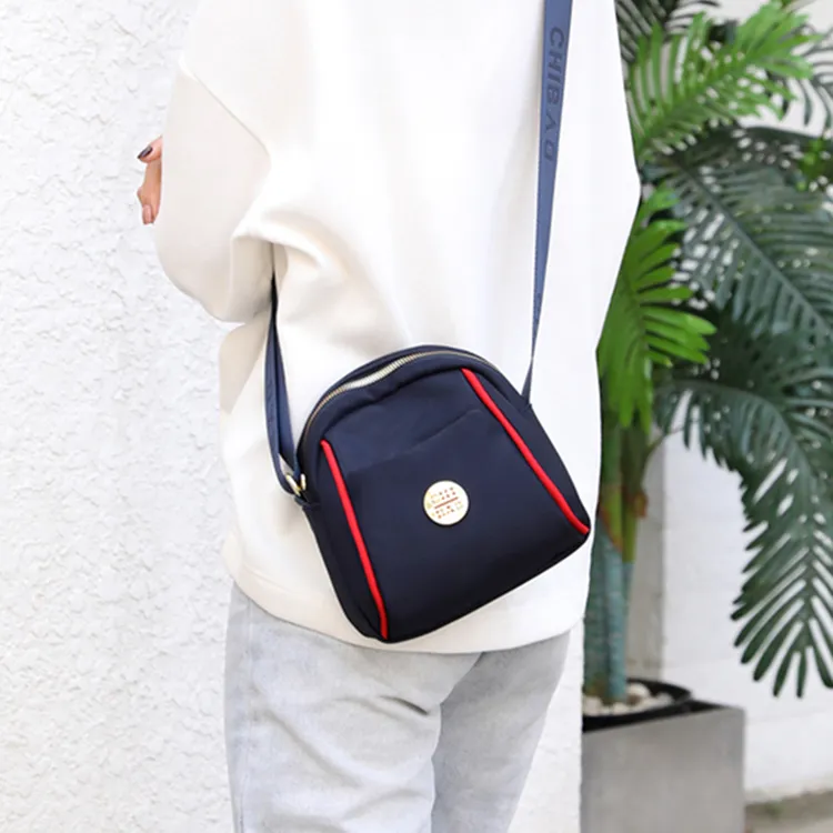 女士休闲小帆布斜挎包贝壳单肩女撞色牛津布迷你百搭轻便布包1845