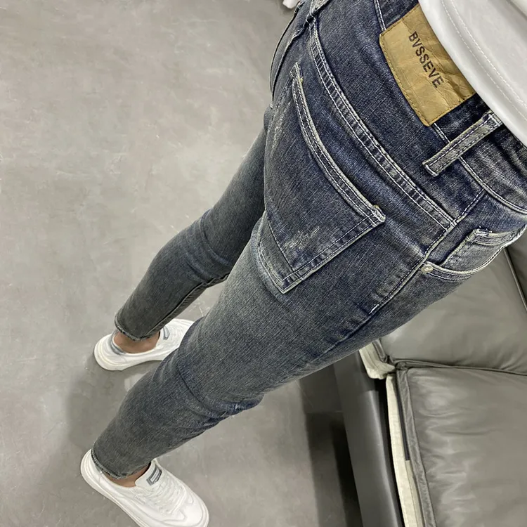 一款经典百搭的复古做旧蓝灰色小脚九分牛仔长裤潮男高街弹力裤子