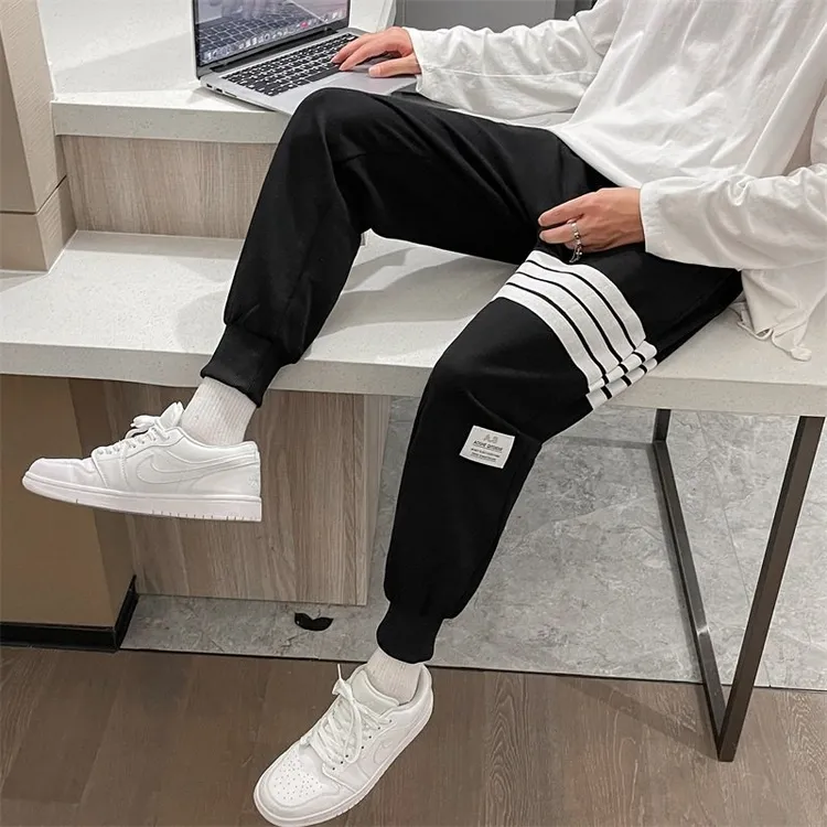 25秋冬港风宽松中性男女情侣休闲裤四条杠运动百搭卫裤K2052
