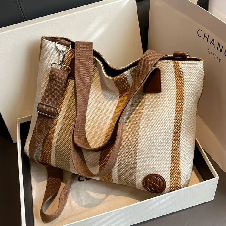 外出通勤包女大容量包包2024新款休闲大学生上课包帆布单肩托特包