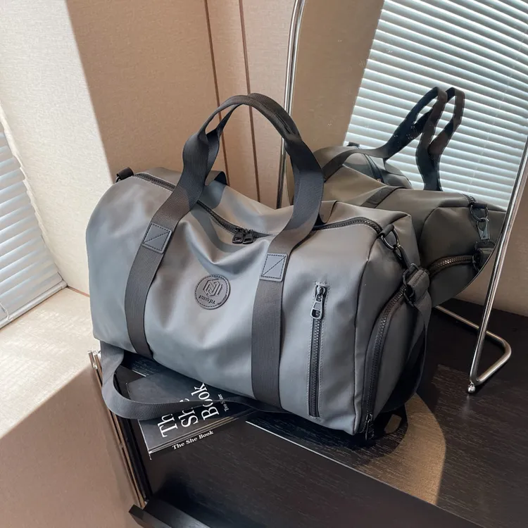 探屿旅行包大容量手提包女士短期肩包装衣服行李包干湿分离健身包