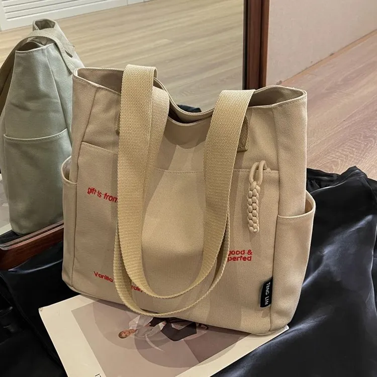帆布包包女大容量2024新款夏季休闲单肩包学生上课通勤手提托特包