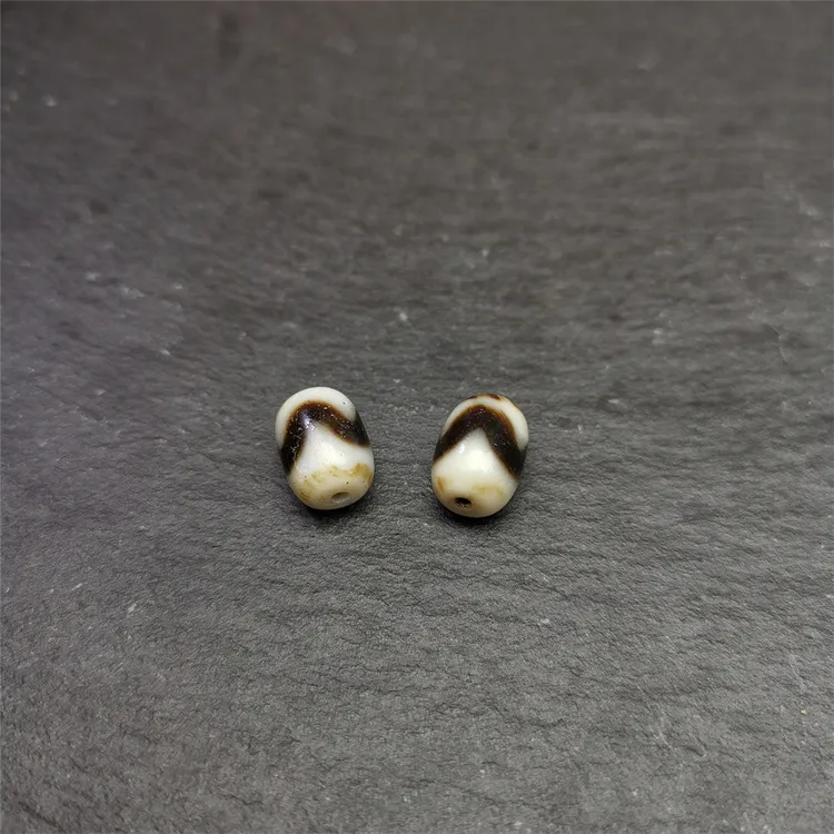 藏传T珠虎牙光面10mm隔珠一对佛珠手串配饰凤眼菩提甘丹拉