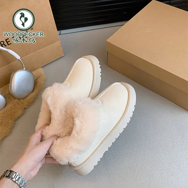 啄木鸟平底皮毛一体雪地靴女2024新款冬季一脚蹬加绒保暖毛毛棉鞋