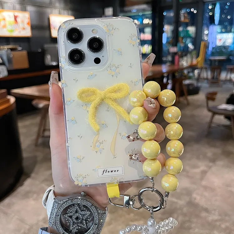 适用苹果华为系iPhone16新款手机壳网红小清新黄蓝小碎花黄蝴蝶结