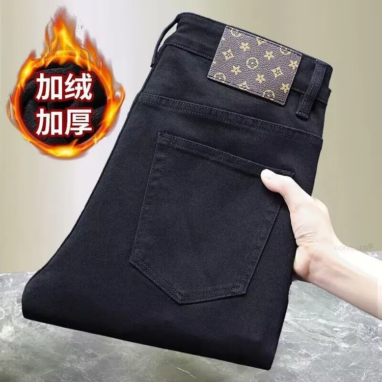 不粘毛纯黑牛仔裤男款秋冬新款弹力修身小脚潮