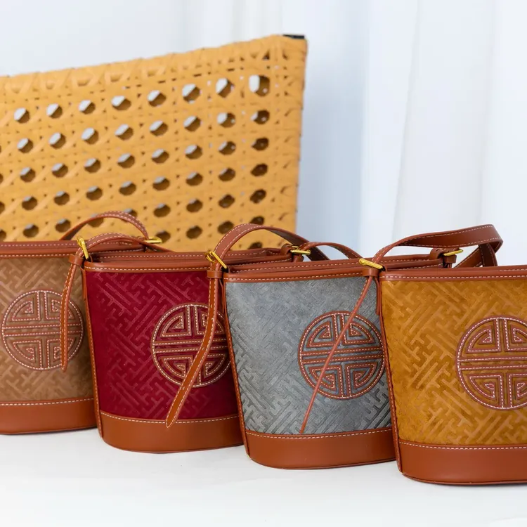 民族风复古时尚百搭大容量斜挎手提水桶包女款