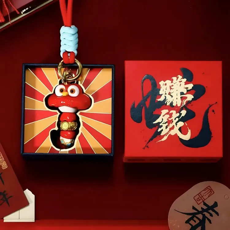 2025新年腰缠万贯赚钱蛇转动黄金蛇手玩件钥匙扣本命年包挂件wmz