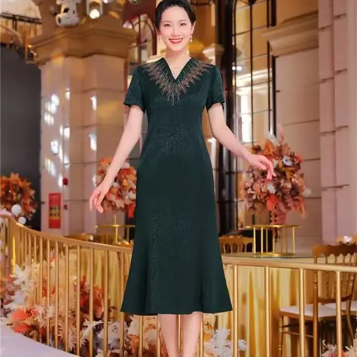 南油高端特价时尚气质显瘦长款祖母绿连衣裙9138