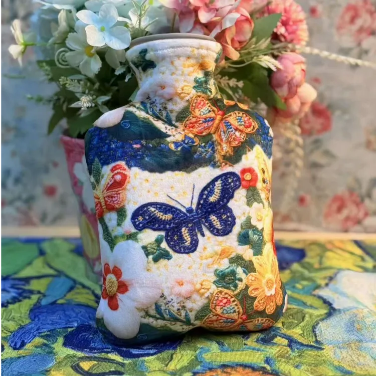 1000ML冬季暖手宝冲注水热水袋防爆pvc绒布印花暖手暖宫家用可爱