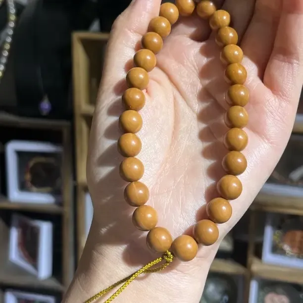 10mm微微暇正圆光珠猴头核桃手持文玩手串