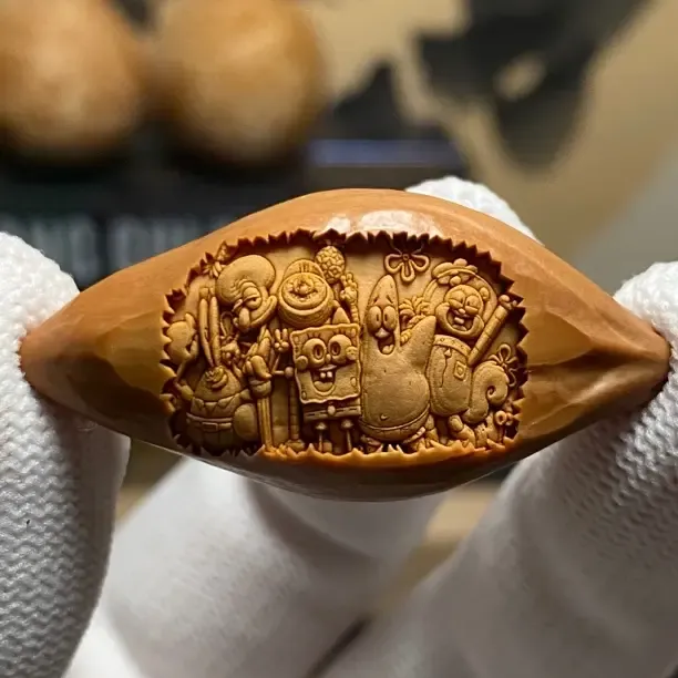 橄榄核雕刻动漫卡通橄榄核雕海绵宝宝搞怪精品文玩手把件吊坠挂件