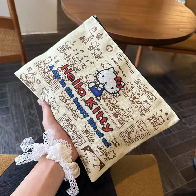 报纸凯蒂猫手拿森系高颜值小众爆款外出ins收纳学生化妆手拿包jl