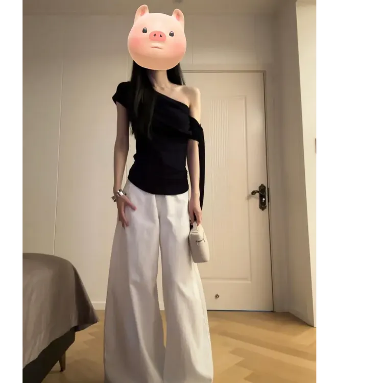 无袖收腰斜肩上衣女春季设计感白色高腰拖地阔腿牛仔裤女两件套
