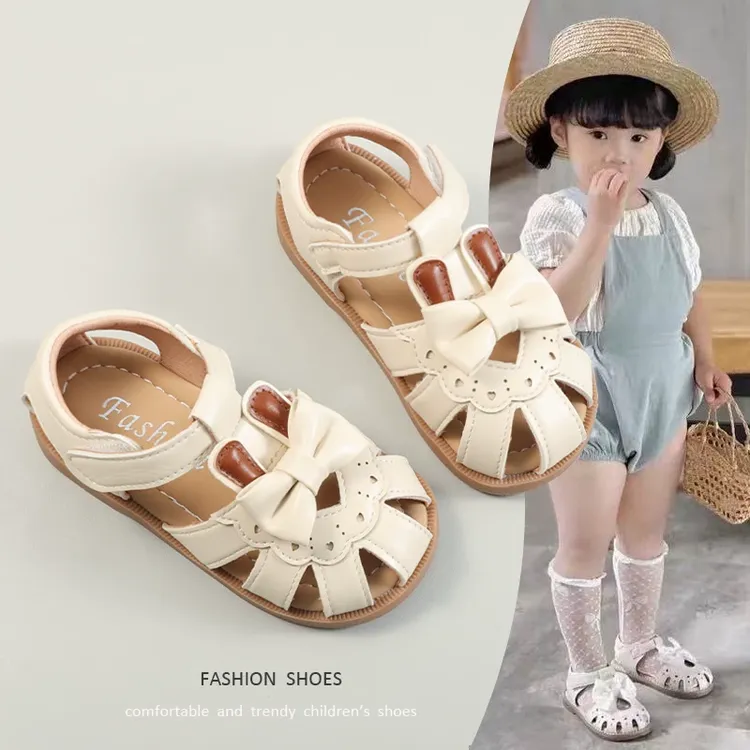 女童包头凉鞋2025夏季新款儿童可爱蝴蝶结镂空公主鞋宝宝沙滩凉拖