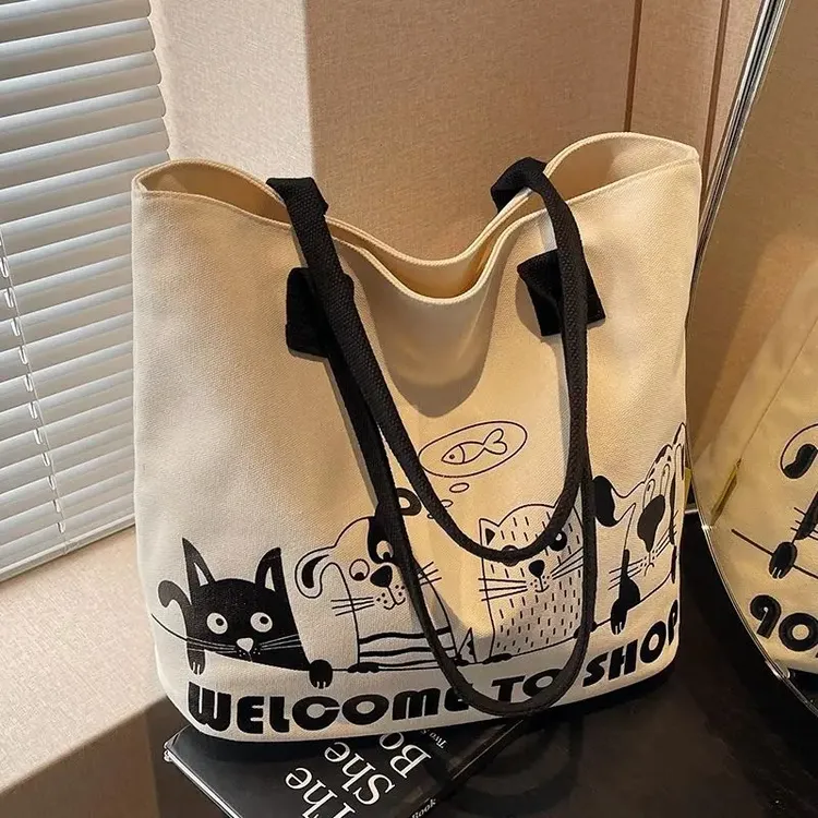 2025新款大容量帆布包女休闲外出手提购物包时尚通勤包单肩托特包