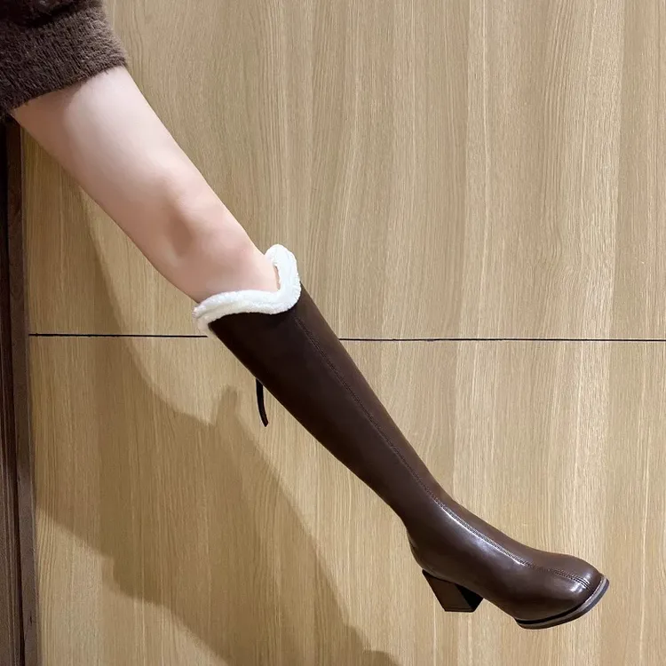 香港真皮长筒雪地靴女2024新款冬季皮毛一体加绒加厚高筒高跟棉鞋