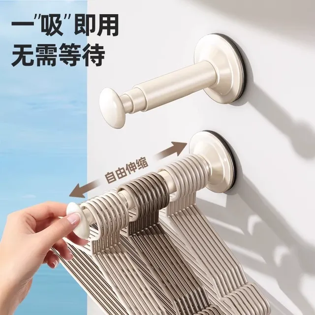 吸盘伸缩衣架收纳架免打孔家用阳台墙可伸缩晾衣架整理挂钩壁挂式