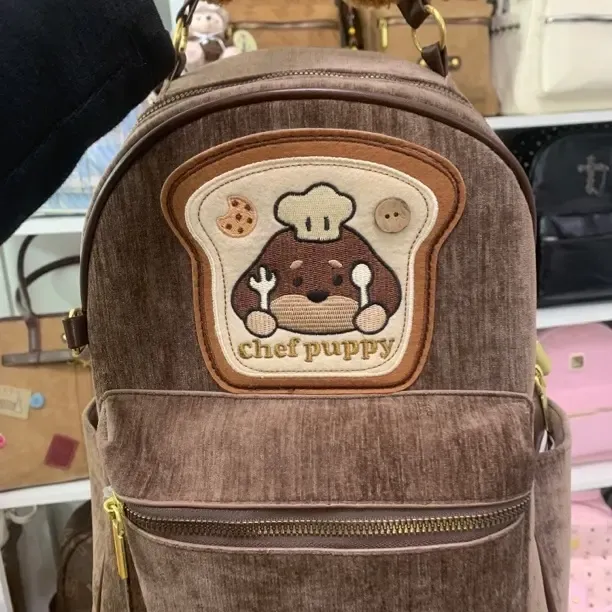 双肩包卡通厨师狗大容量可爱学院风百搭学生休闲防脏背包