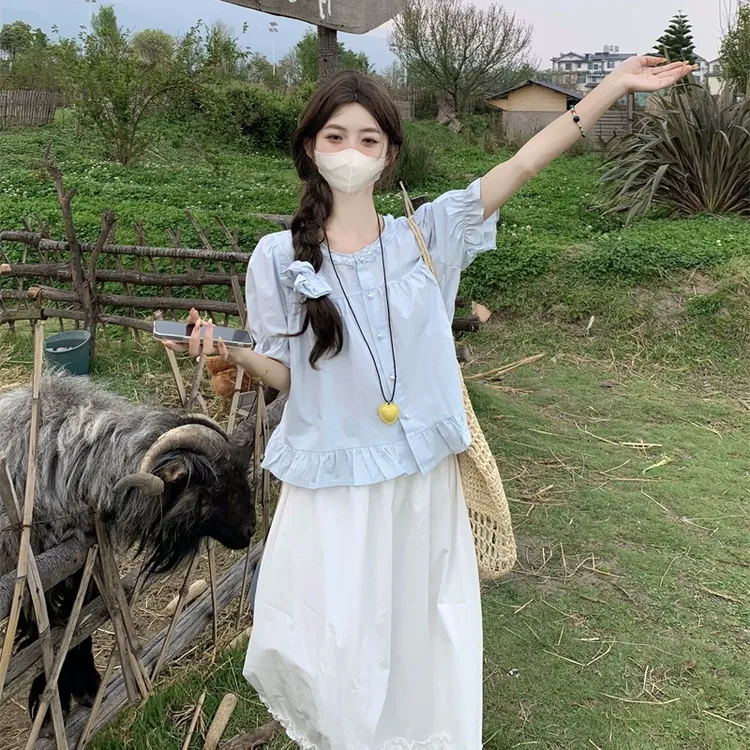 蓝色棉麻夏日多巴胺樱花短袖上衣女片森系田园风出泡泡袖衬衫