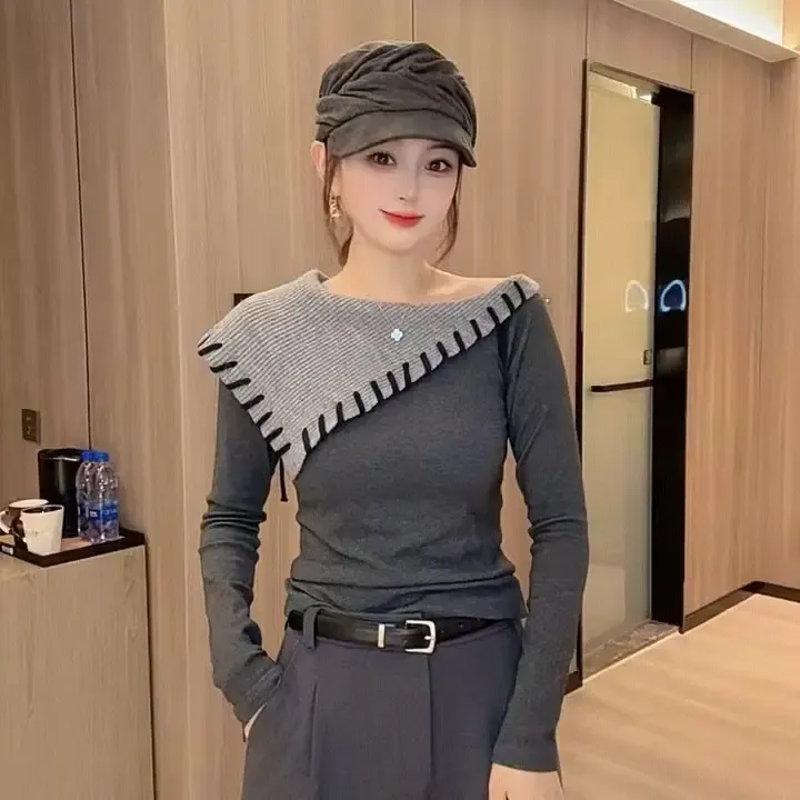 设计感拼接撞色斜肩大翻领女2025秋季修身显瘦百搭上衣