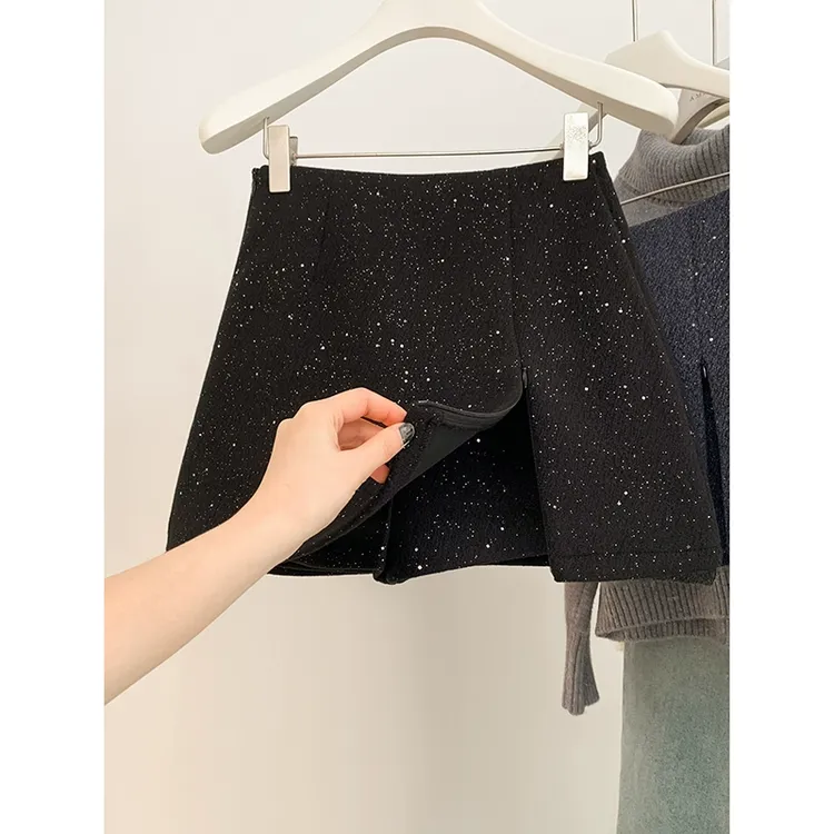 黑色细闪毛呢裤裙女2025秋季新品时尚设计感裙裤百搭a字高腰短裤