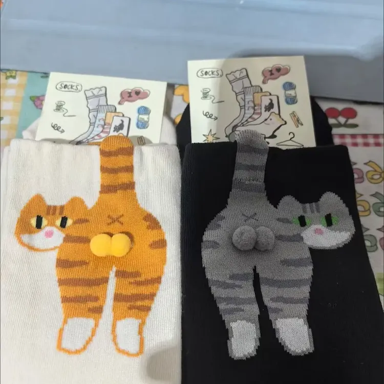 白色卡通猫咪叮叮当蛋蛋袜子女夏季ins棉可爱搞怪中筒袜H317