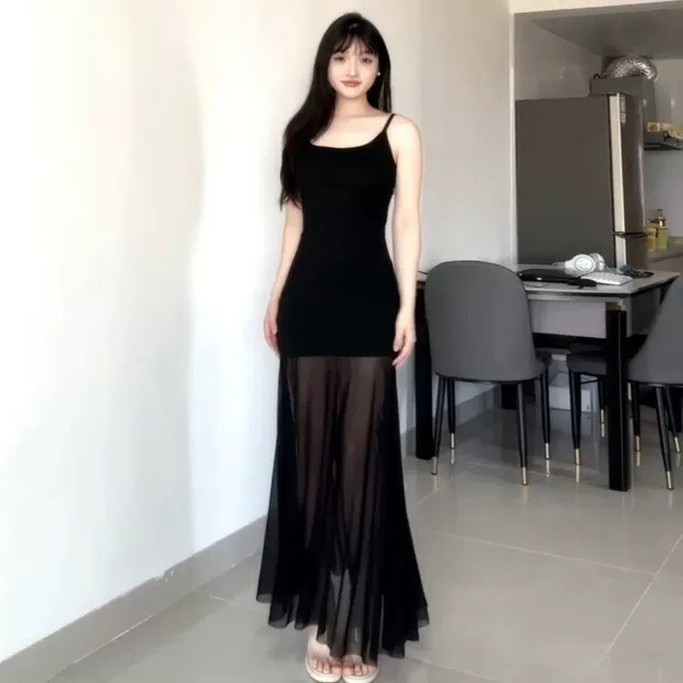 黑色网纱拼接吊带包臀连衣裙子女夏季2025新款气质海边度假风长裙