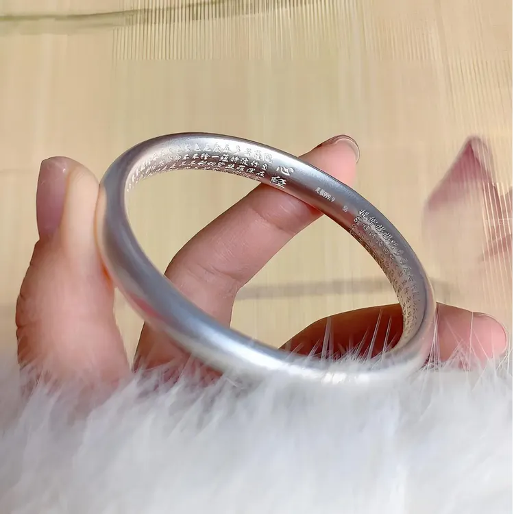 足银9999古法面泥鳅背后壁中空錾刻心经闭口纯银手镯