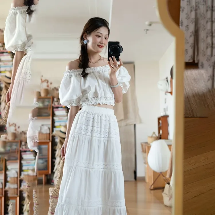 法式初恋甜美套装女夏高级感镂空拼接一字肩上衣字半身裙两件套