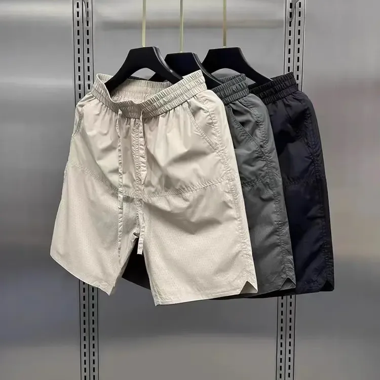 夏季新款激光打孔透气休闲短裤男锦纶速干夏季短裤冰丝速干五分裤