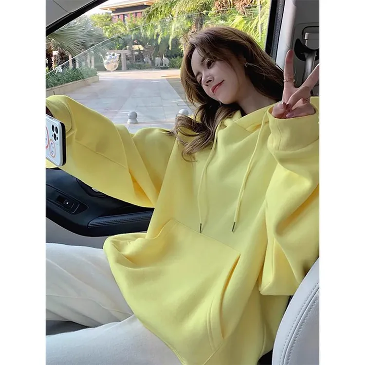 黄色连帽卫衣女2025春季新款宽松显瘦时尚中长款加绒加厚套头上衣