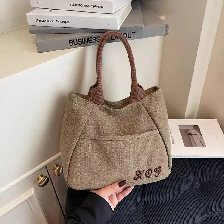 小众帆布包女出门上班小拎包通勤托特包2025新款百搭饭盒手提包