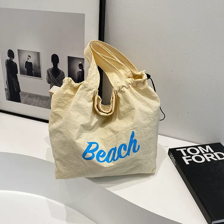 松弛感帆布包慵懒大容量韩系ins风抽绳字母文艺小众海边单肩包包