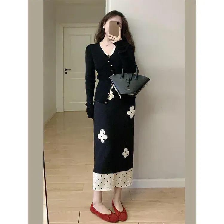 黑色设计感拼接波点包臀半身裙女2025春季修身显瘦气质百搭中长裙