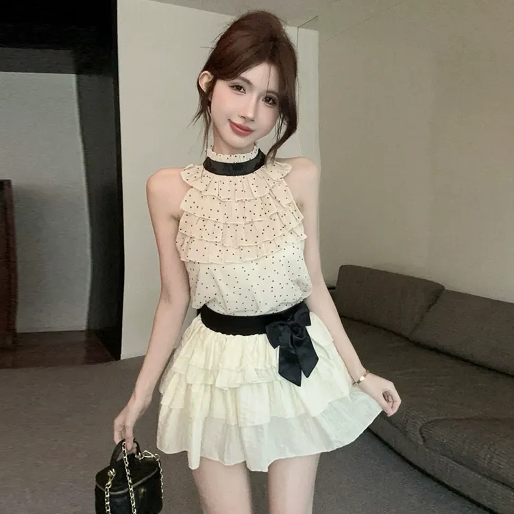 纯欲风挂脖百搭波点修身雪纺上衣+高腰显瘦蝴蝶结半身蛋糕裙套装